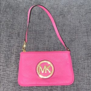 Small pink MK clutch